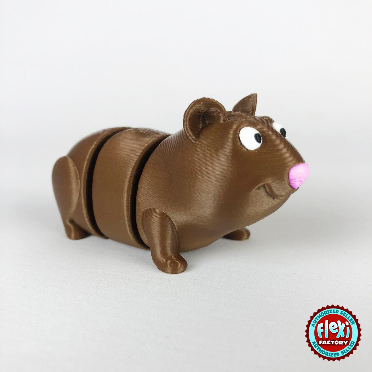 Cute guinea pig keychain, 3D printed by RU3D – three quarter view facing right. Brown with pink nose, also brown and white.