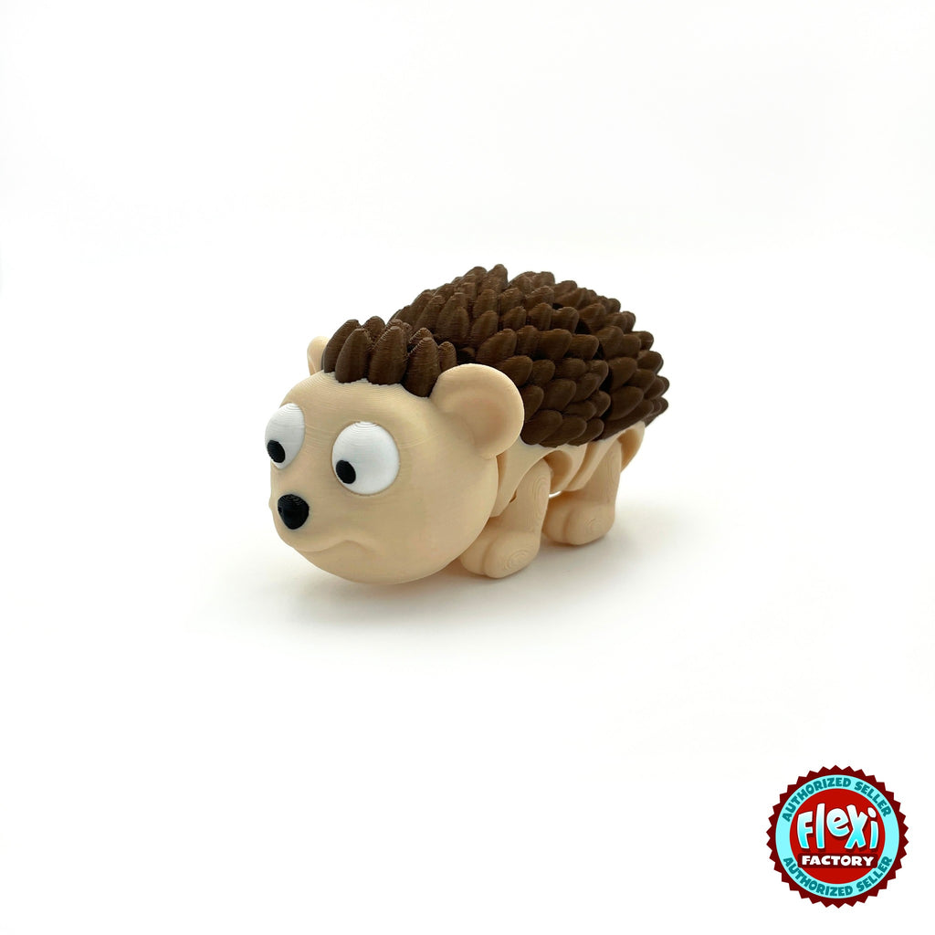 Cute hedgehog keychain, 3D printed by RU3D – close up three quarter view facing left. Cream face with dark brown spikes.