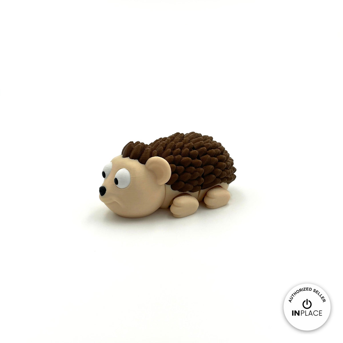 Cute hedgehog keychain, 3D printed by RU3D – three quarter view facing left. Cream face with dark brown spikes.