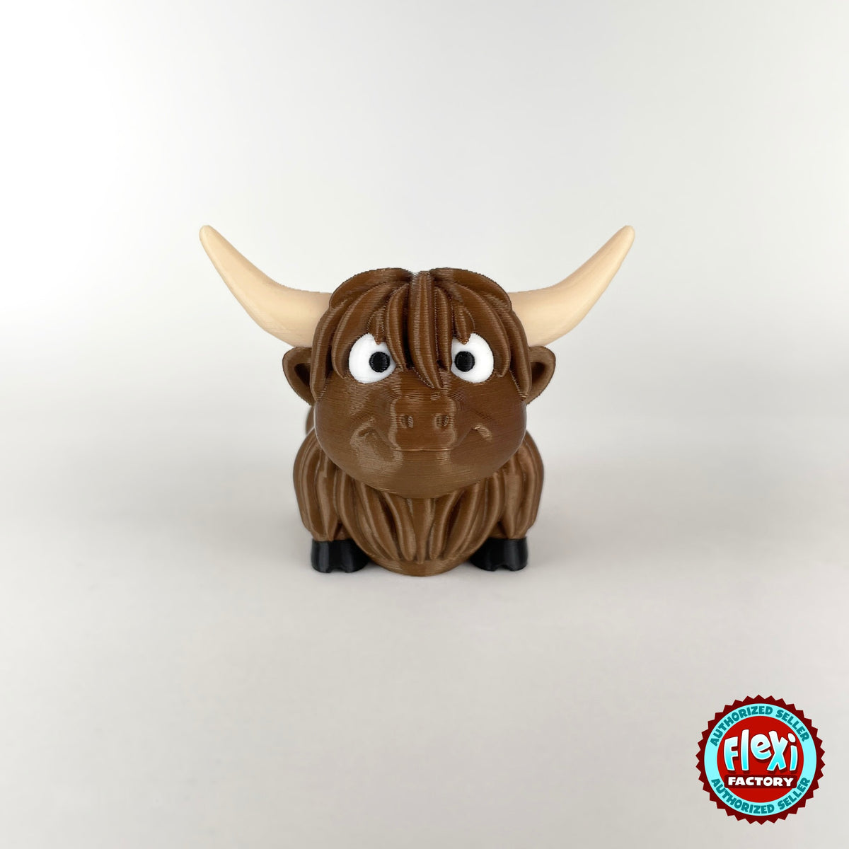 Cute Highland cow keychain, 3D printed by RU3D – front view no muzzle. Shaggy brown with cream horns.
