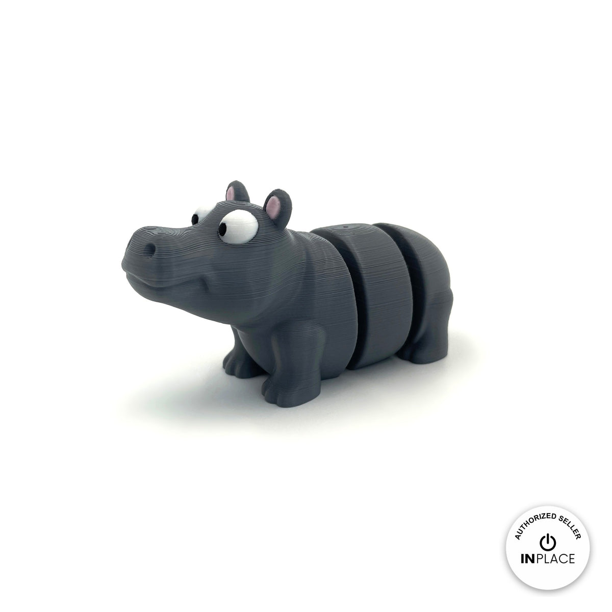 Cute hippo keychain, 3D printed by RU3D – three quarter view facing left. Grey with pink ears.