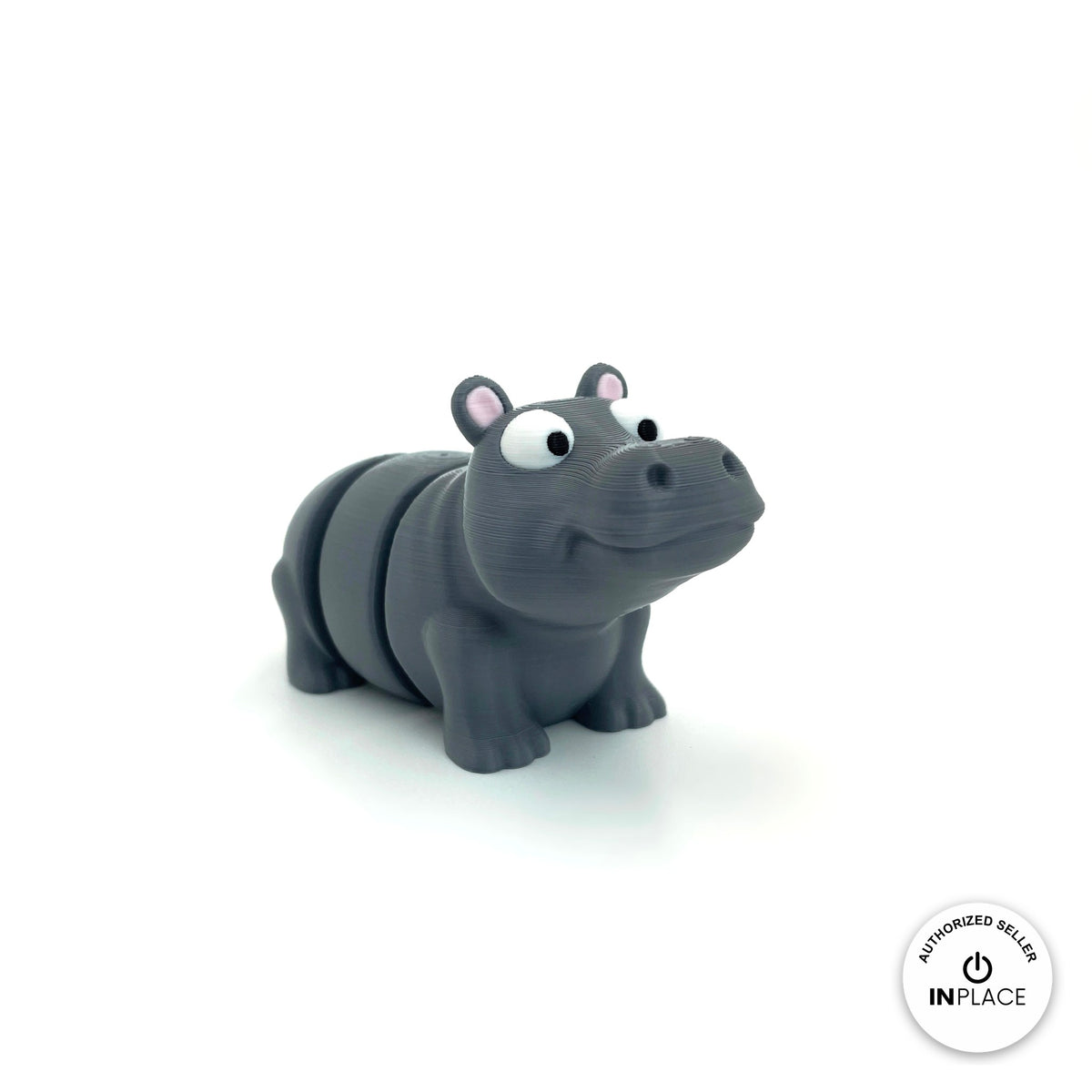 Cute hippo keychain, 3D printed by RU3D – three quarter view facing right. Grey with pink ears.