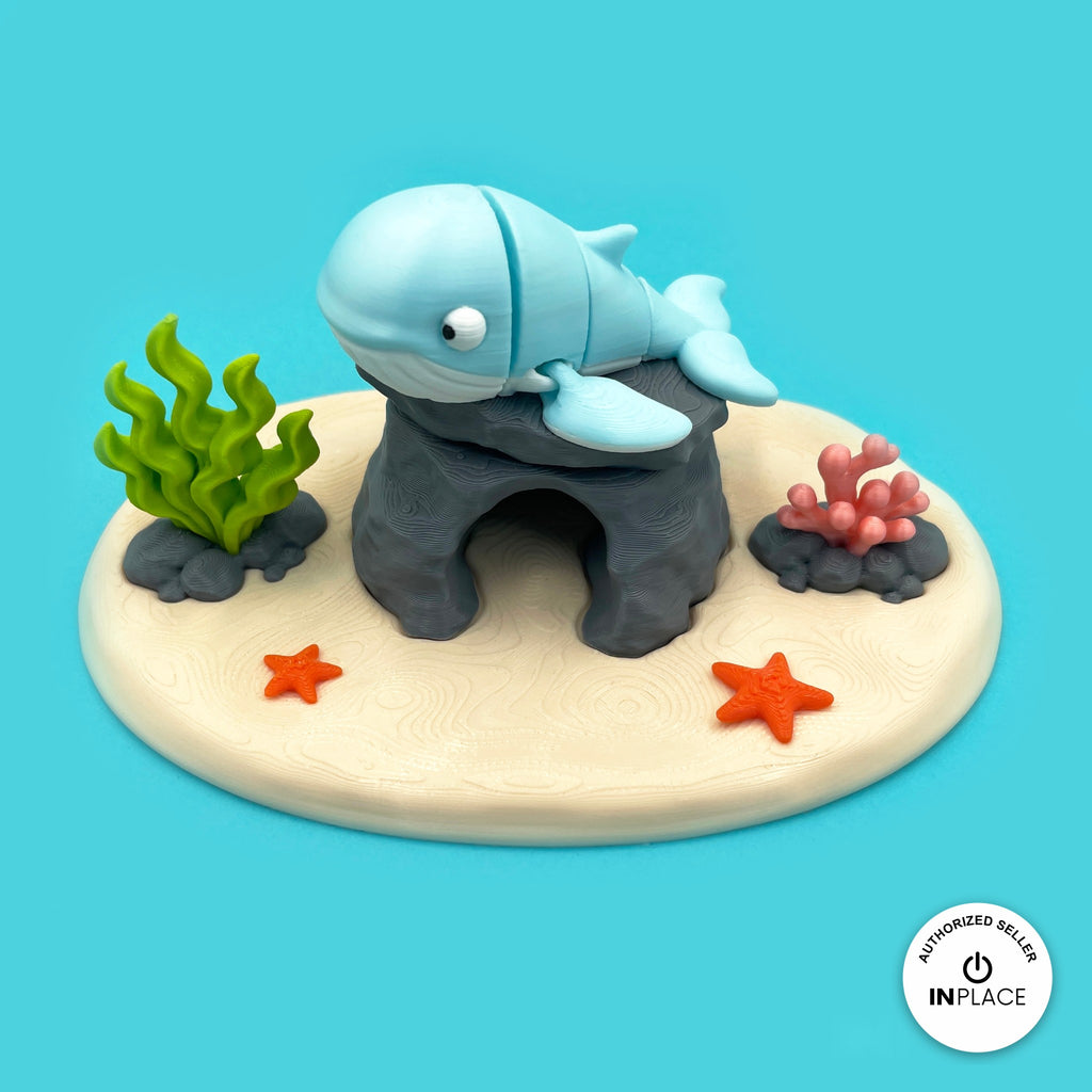3D printed ocean reef platform by RU3D, shown with the Humpback Whale keychain