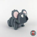 Cute koala keychain, 3D printed by RU3D – three quarter view facing right. Grey with pink ears.