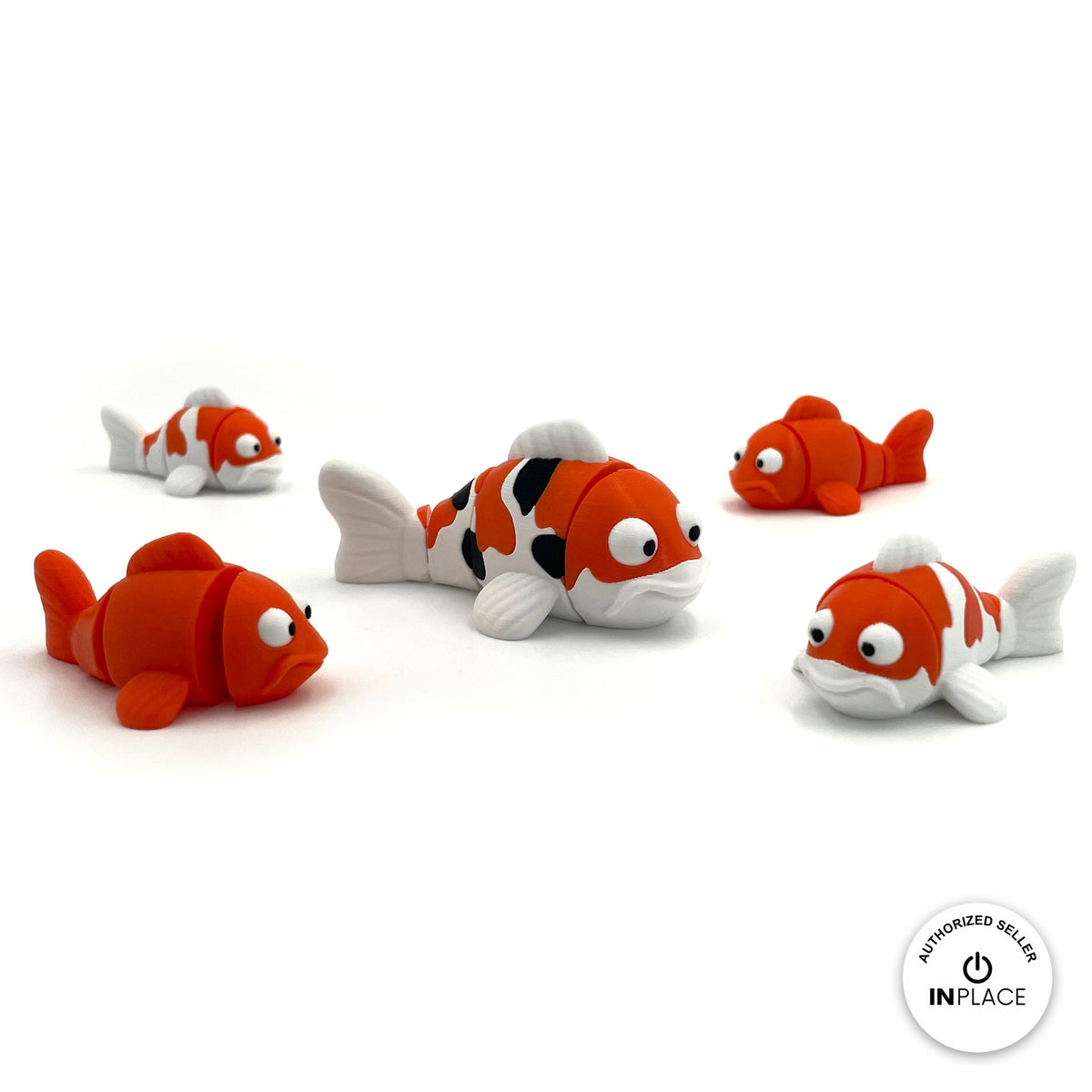 Cute koi fish keychain, 3D printed by RU3D – group of koi fish. Orange, white and black, also in solid orange.
