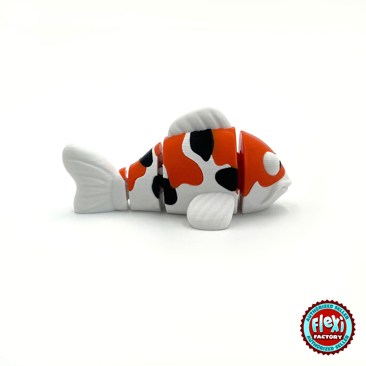 Cute koi fish keychain, 3D printed by RU3D – side view facing right. Orange, white and black, also in solid orange.
