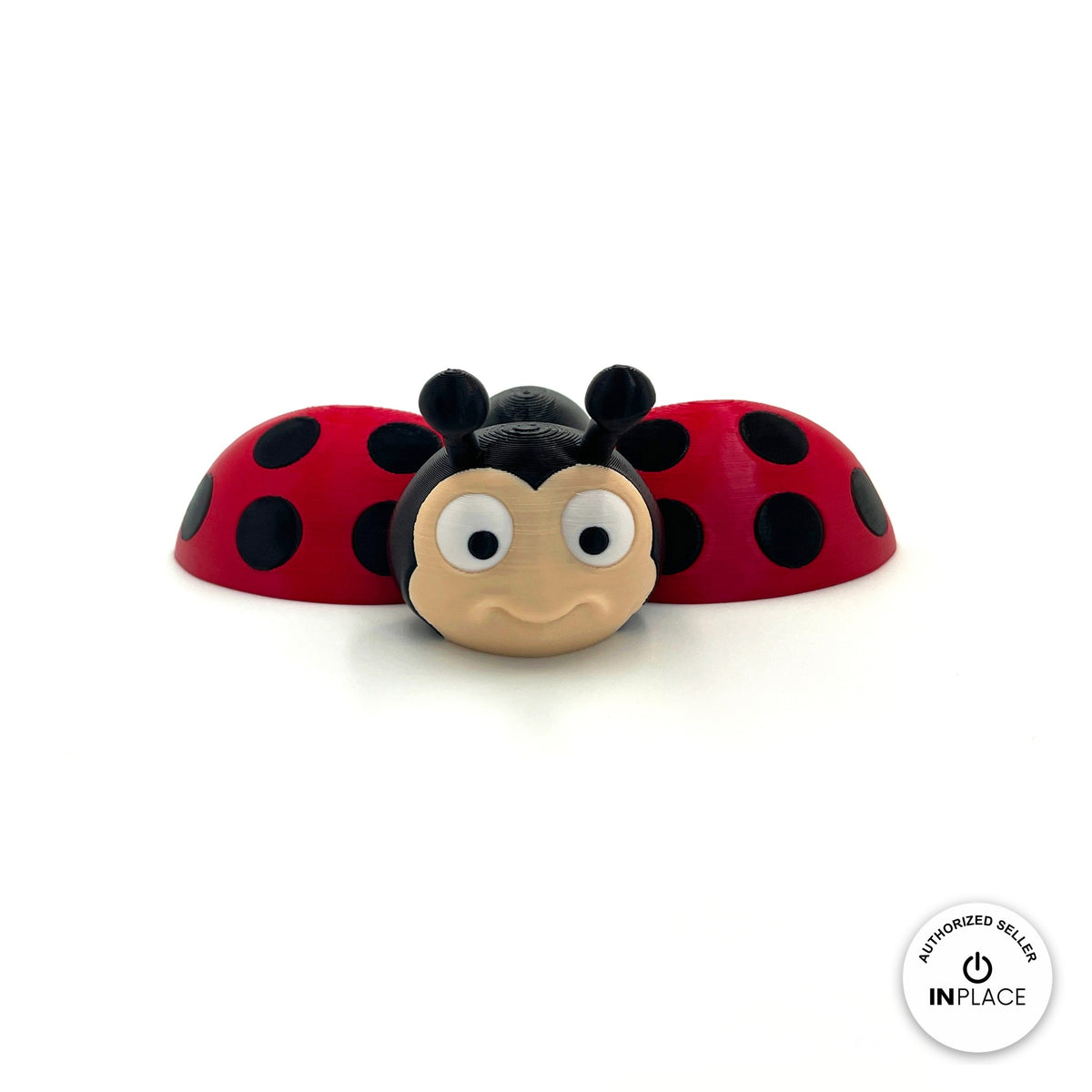 Cute ladybug keychain, 3D printed by RU3D – front view wings open. Red with black spots.