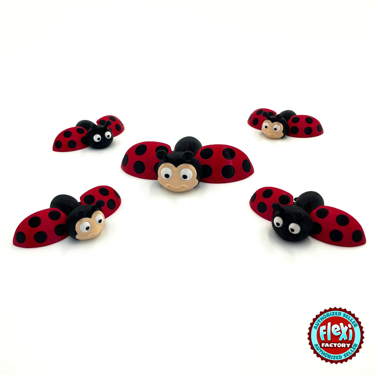 Cute ladybug keychain, 3D printed by RU3D – group of ladybugs wings open. Red with black spots.