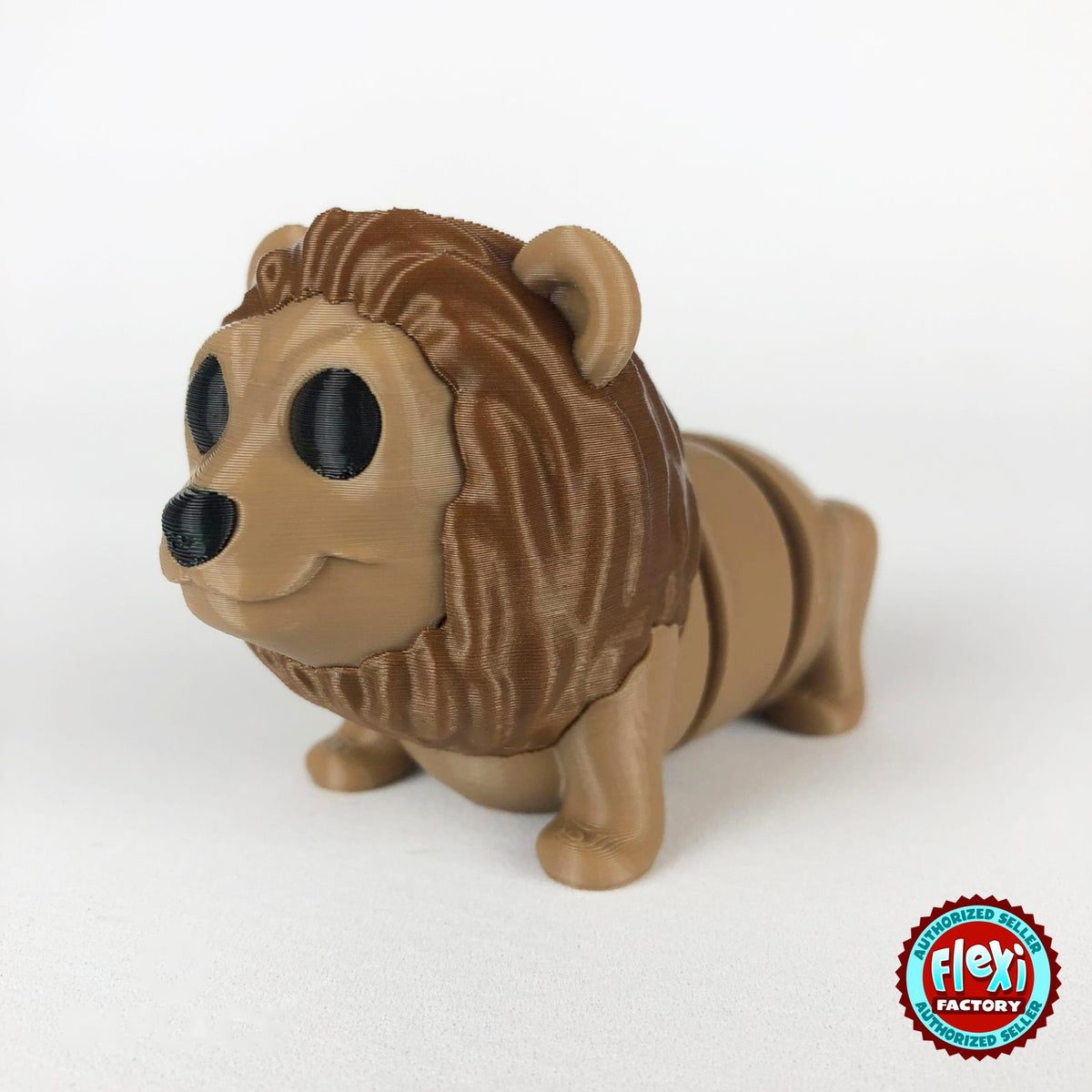 Cute lion keychain, 3D printed by RU3D – dark eyes three quarter view facing left. Tan with brown mane.