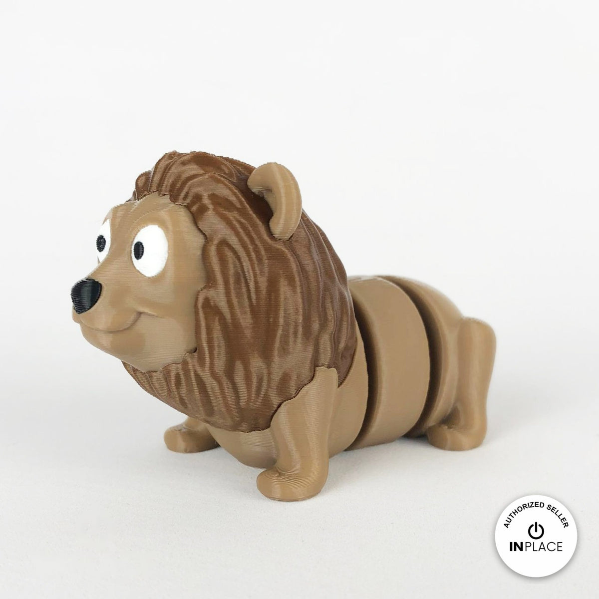 Cute lion keychain, 3D printed by RU3D – three quarter view facing left. Tan with brown mane.