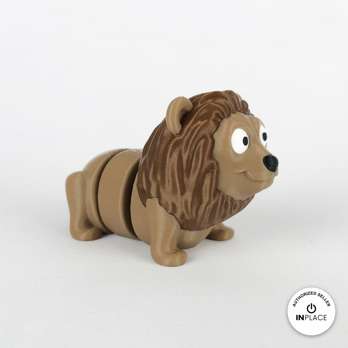 Cute lion keychain, 3D printed by RU3D – three quarter view facing right. Tan with brown mane.