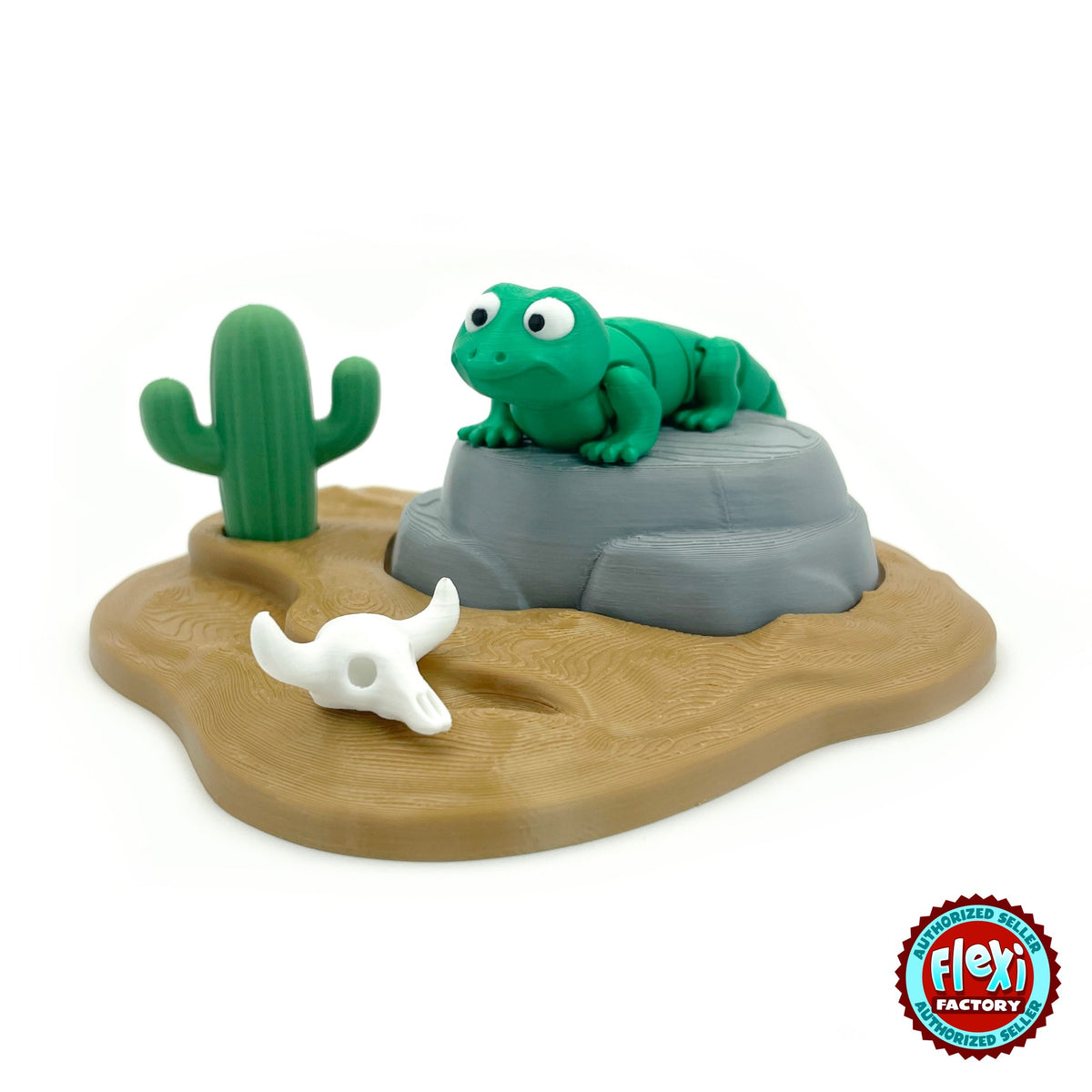 Cute lizard keychain, 3D printed by RU3D – front view on desert rock. Green with desert rock playset.
