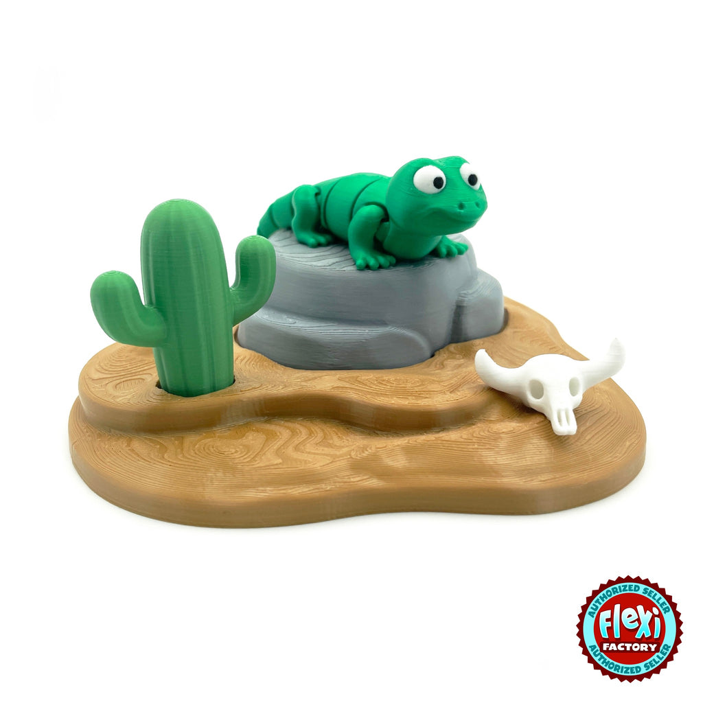 Cute lizard keychain, 3D printed by RU3D – on desert rock playset. Green with desert rock playset.