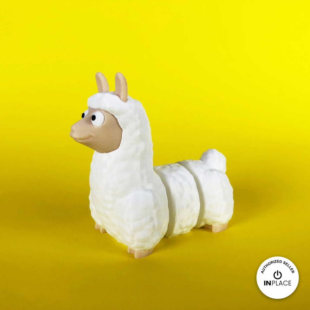 Cute llama keychain, 3D printed by RU3D – three quarter view facing left. Fluffy white with tan face.
