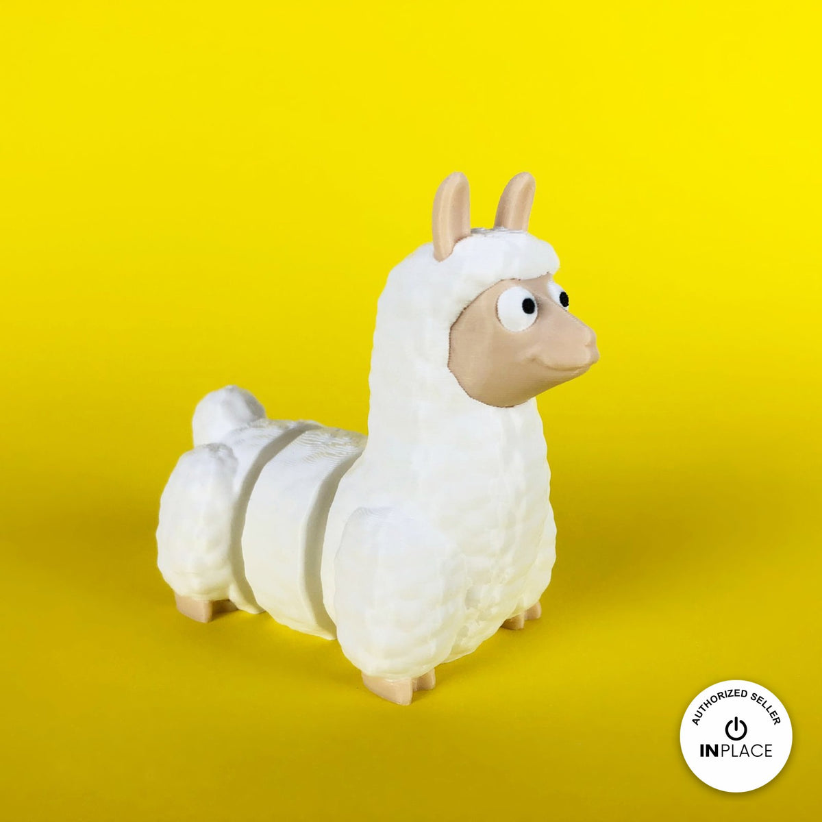 Cute llama keychain, 3D printed by RU3D – three quarter view facing right. Fluffy white with tan face.