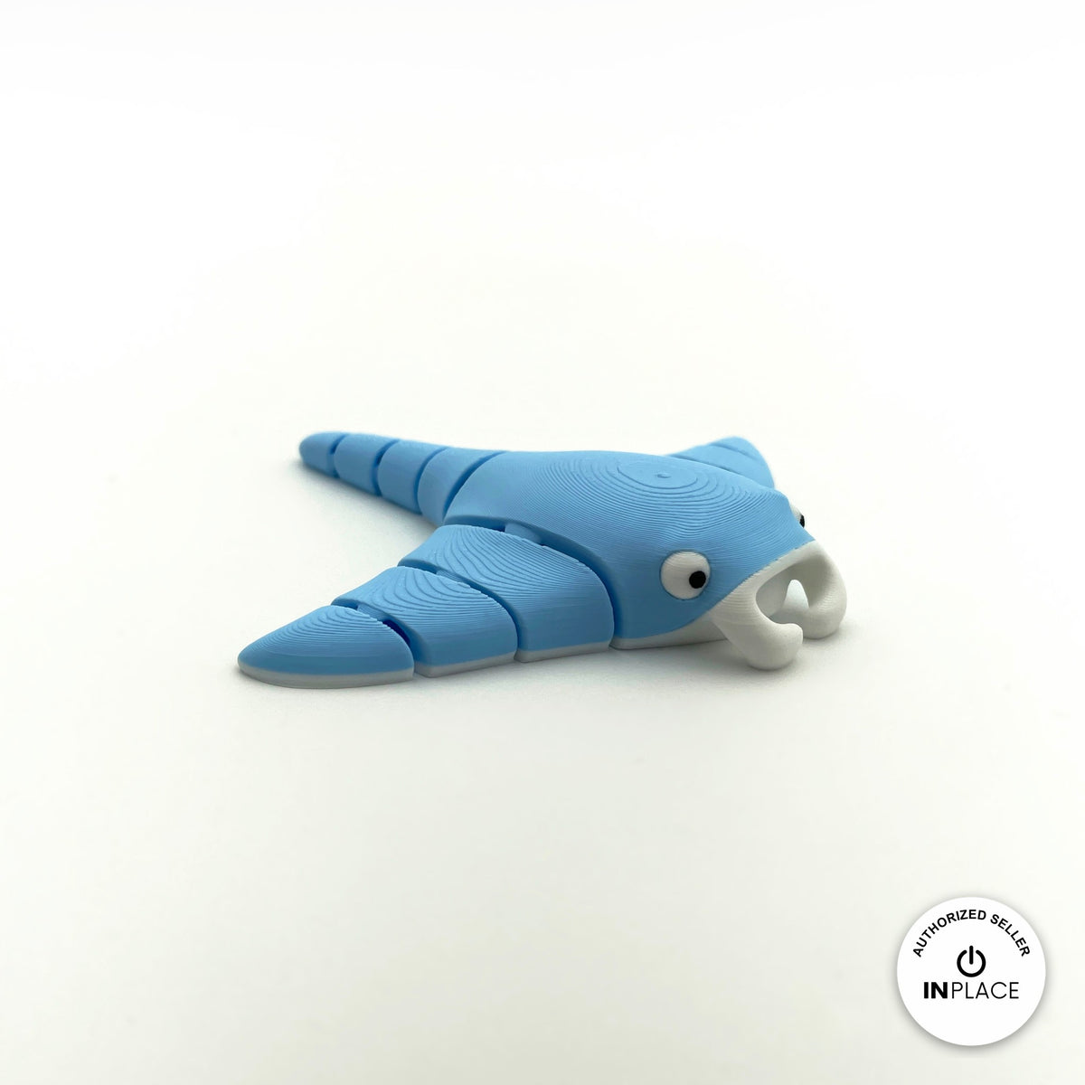 Cute manta ray keychain, 3D printed by RU3D – blue side view facing right. Light blue, also in grey.