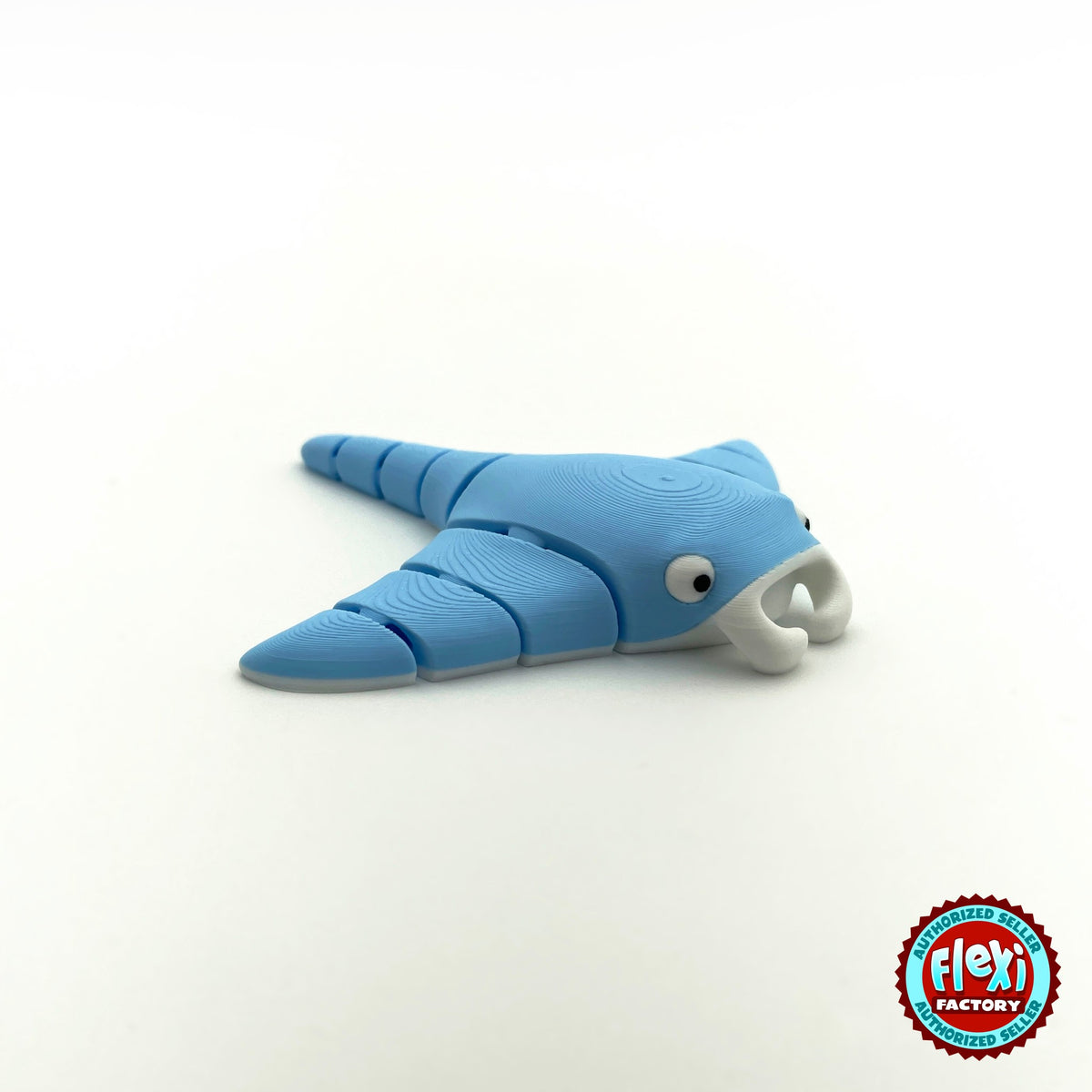 Cute manta ray keychain, 3D printed by RU3D – blue side view facing right. Light blue, also in grey.