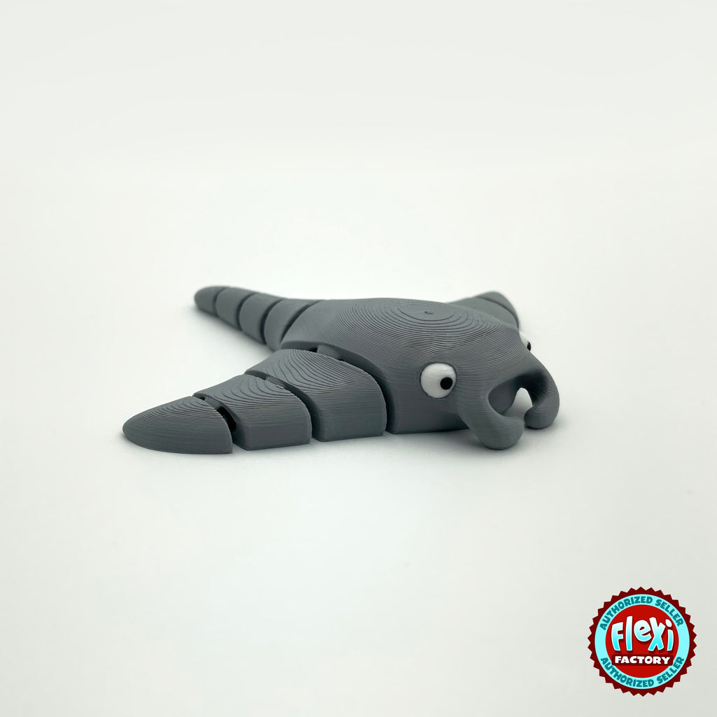 Cute manta ray keychain, 3D printed by RU3D – grey side view facing right. Light blue, also in grey.