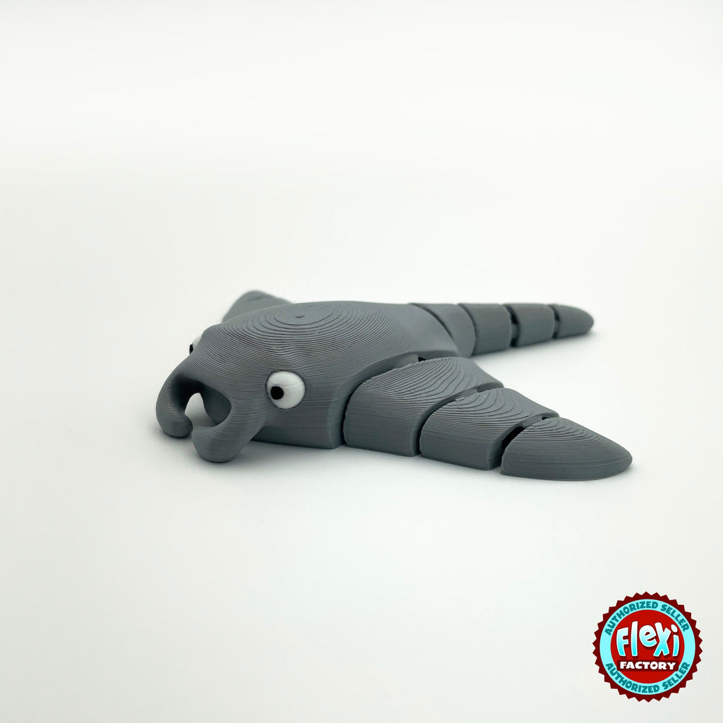 Cute manta ray keychain, 3D printed by RU3D – grey three quarter view facing left. Light blue, also in grey.