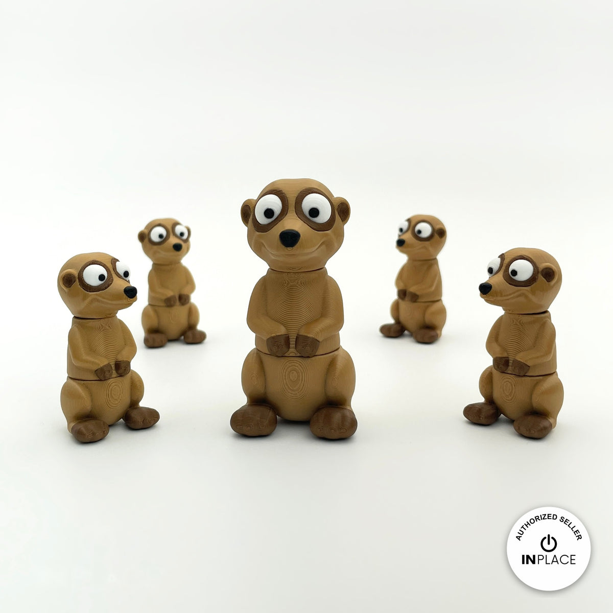 Cute meerkat keychain, 3D printed by RU3D – group of meerkats. Tan and dark brown.