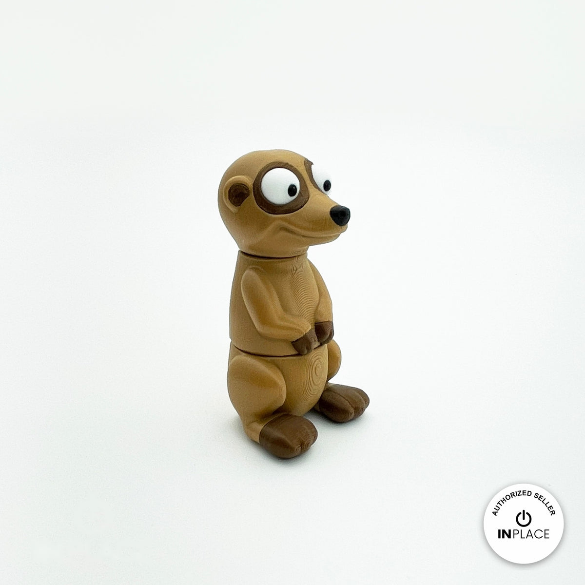 Cute meerkat keychain, 3D printed by RU3D – standing side view facing right. Tan and dark brown.