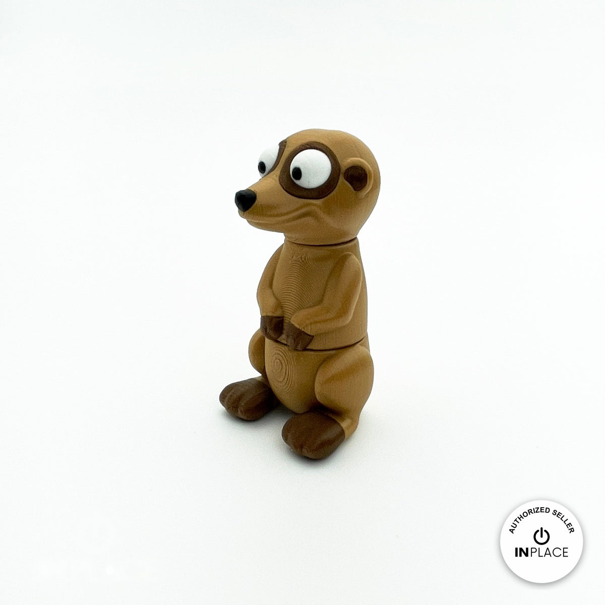 Cute meerkat keychain, 3D printed by RU3D – standing three quarter view facing left. Tan and dark brown.