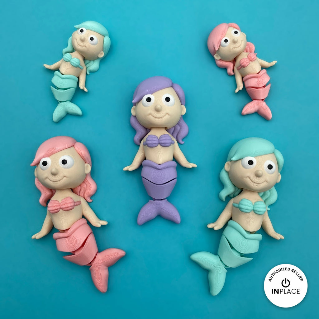 Cute mermaid keychain, 3D printed by RU3D – group of mermaids. Pastel pink, purple and teal tails.