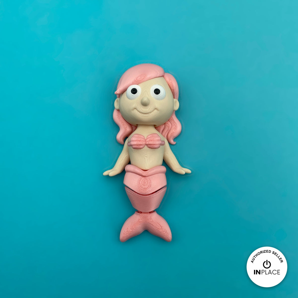Cute mermaid keychain, 3D printed by RU3D – pink mermaid front view. Pastel pink, purple and teal tails.