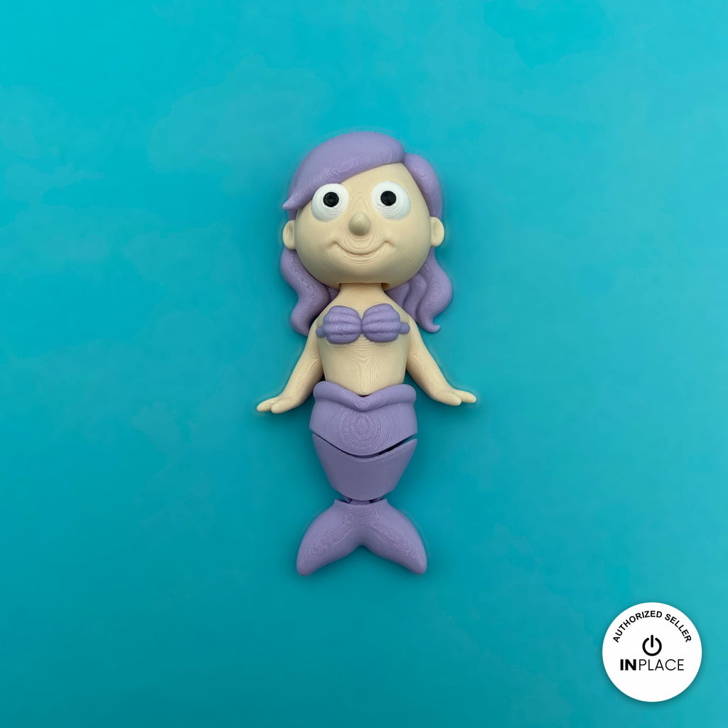 Cute mermaid keychain, 3D printed by RU3D – purple mermaid front view. Pastel pink, purple and teal tails.