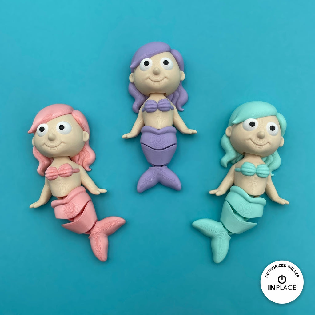 Cute mermaid keychain, 3D printed by RU3D – three mermaids pink purple teal. Pastel pink, purple and teal tails.