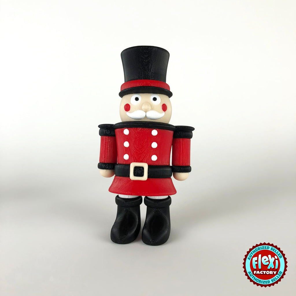 Cute nutcracker soldier keychain, 3D printed by RU3D – front view. Red jacket with black top hat and boots.