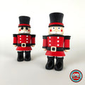 Cute nutcracker soldier keychain, 3D printed by RU3D – pair of nutcrackers. Red jacket with black top hat and boots.