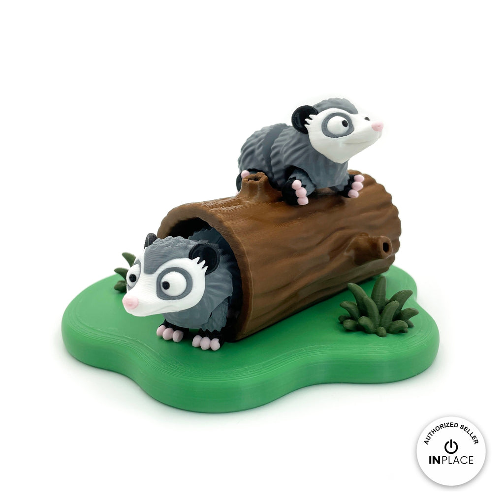 3D printed hollow log platform by RU3D, shown with the Opossum keychain