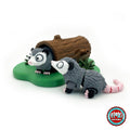 Cute opossum keychain, 3D printed by RU3D – pair of opossums with hollow log. Grey and white with pink tail and hollow log playset.