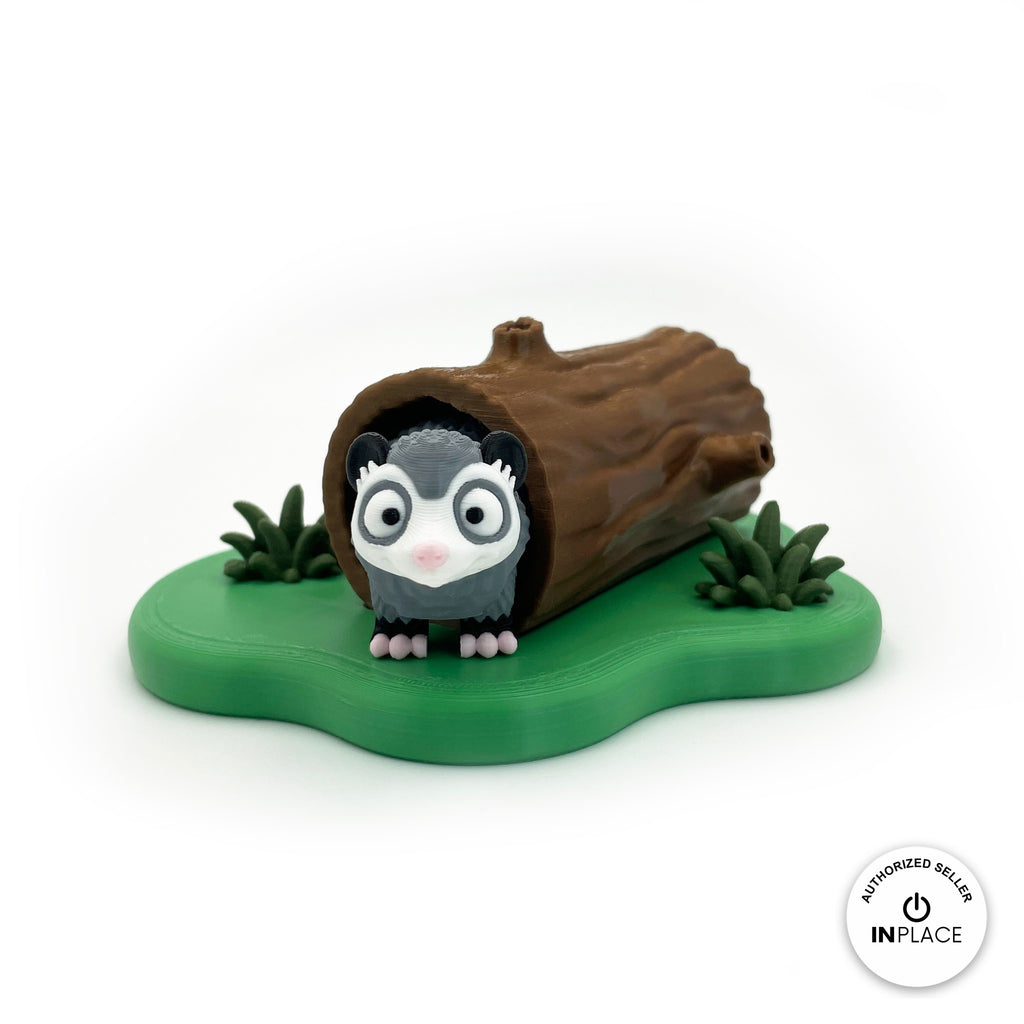 3D printed hollow log platform by RU3D, shown with the Opossum keychain