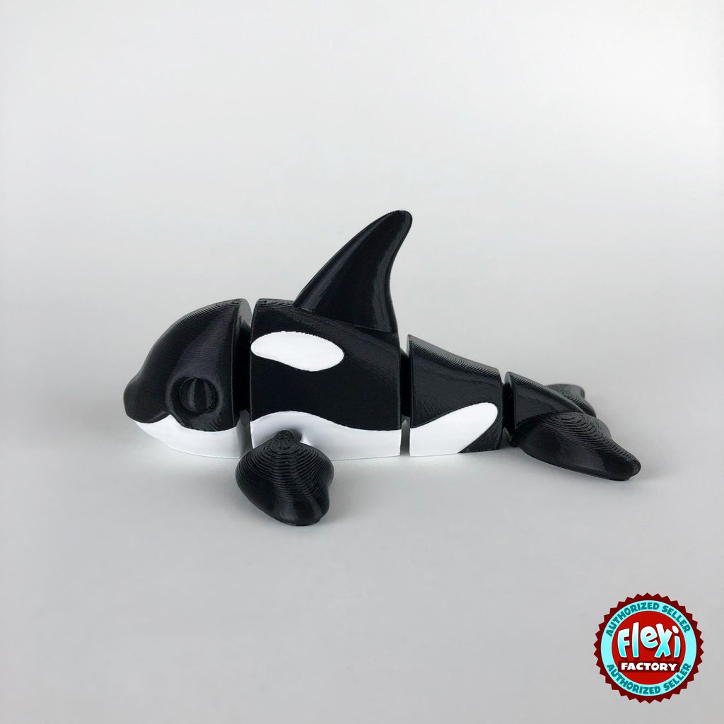 Cute orca killer whale keychain, 3D printed by RU3D – dark eyes side view facing left. Black and white.