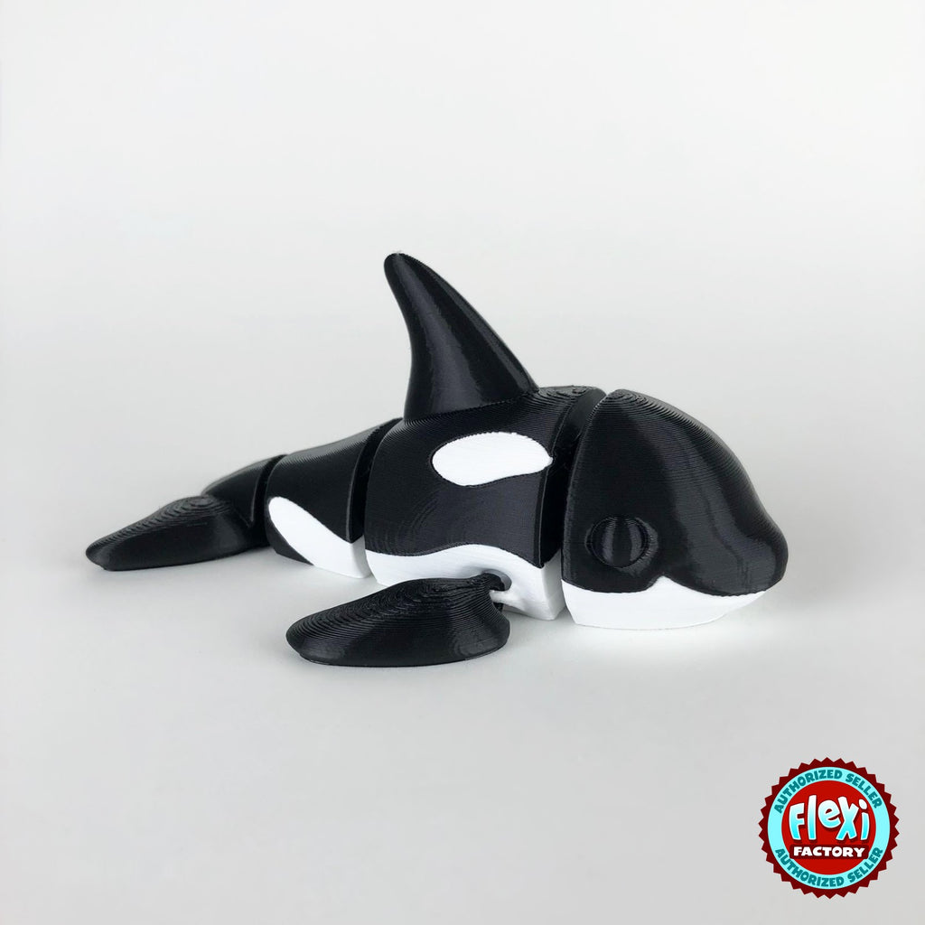 Cute orca killer whale keychain, 3D printed by RU3D – dark eyes side view facing right. Black and white.