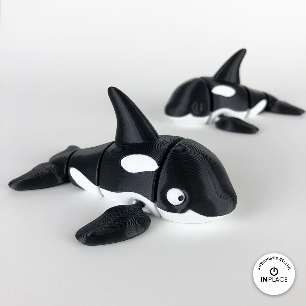Cute orca killer whale keychain, 3D printed by RU3D – pair of orcas. Black and white.