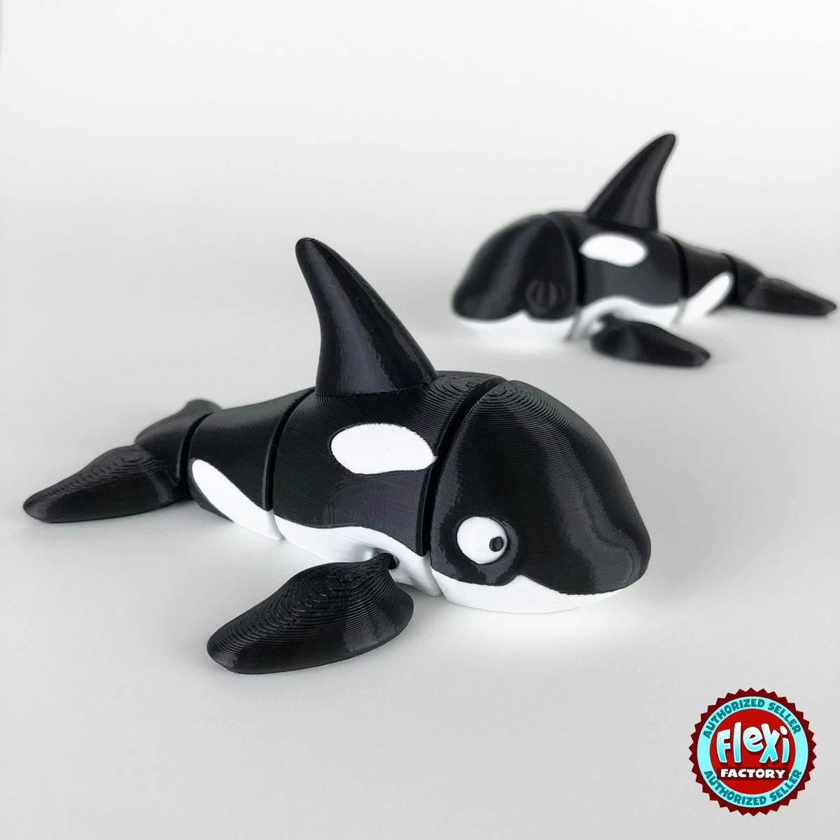 Cute orca killer whale keychain, 3D printed by RU3D – pair of orcas. Black and white.