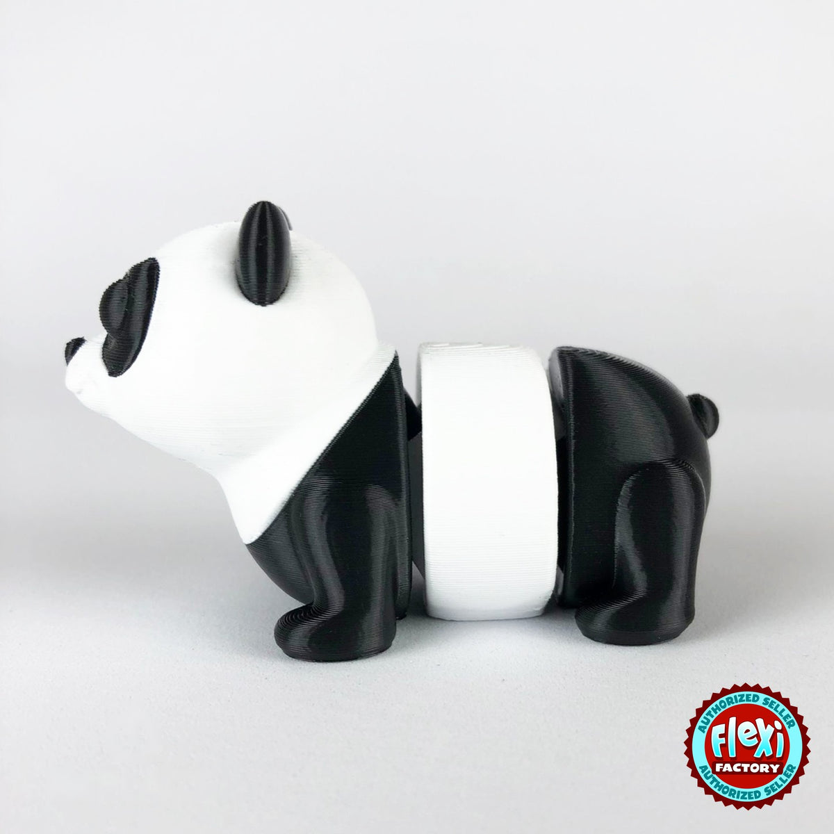 Cute panda keychain, 3D printed by RU3D – dark eyes side view facing left. Black and white.