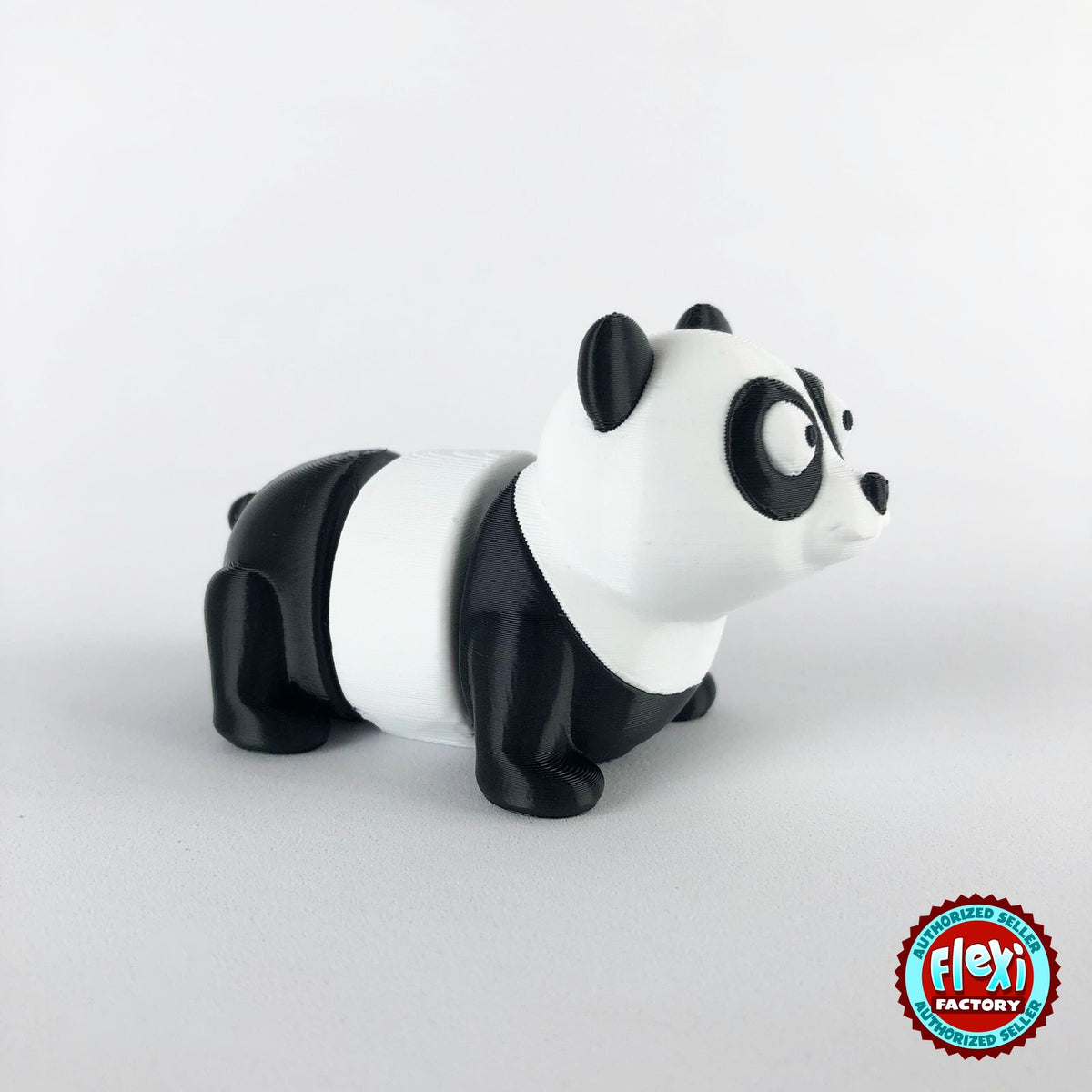 Cute panda keychain, 3D printed by RU3D – side view facing right. Black and white.
