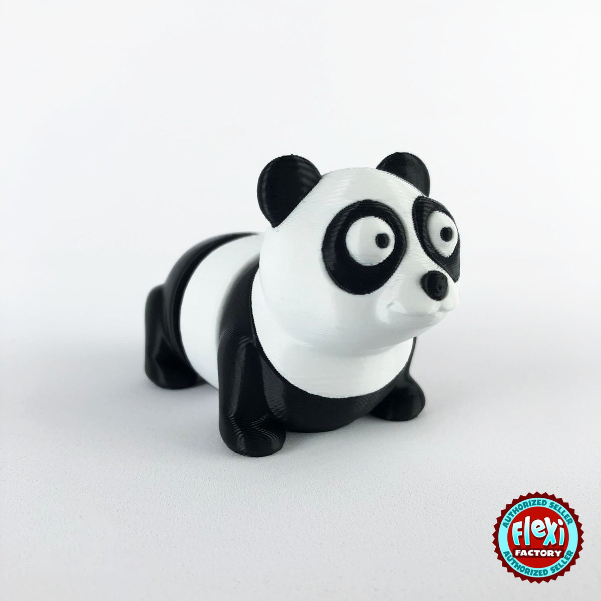Cute panda keychain, 3D printed by RU3D – three quarter view facing right. Black and white.