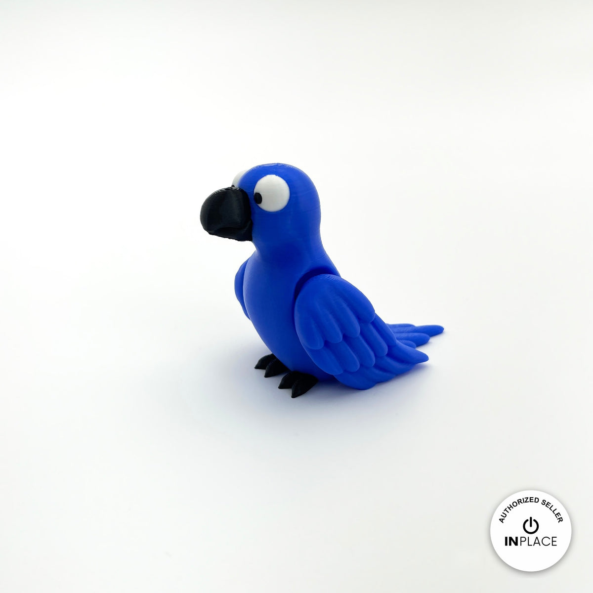 Cute parrot keychain, 3D printed by RU3D – blue parrot side view facing left. Green, blue and red macaw versions.
