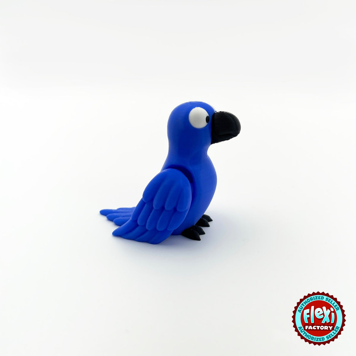 Cute parrot keychain, 3D printed by RU3D – blue parrot three quarter view facing right. Green, blue and red macaw versions.