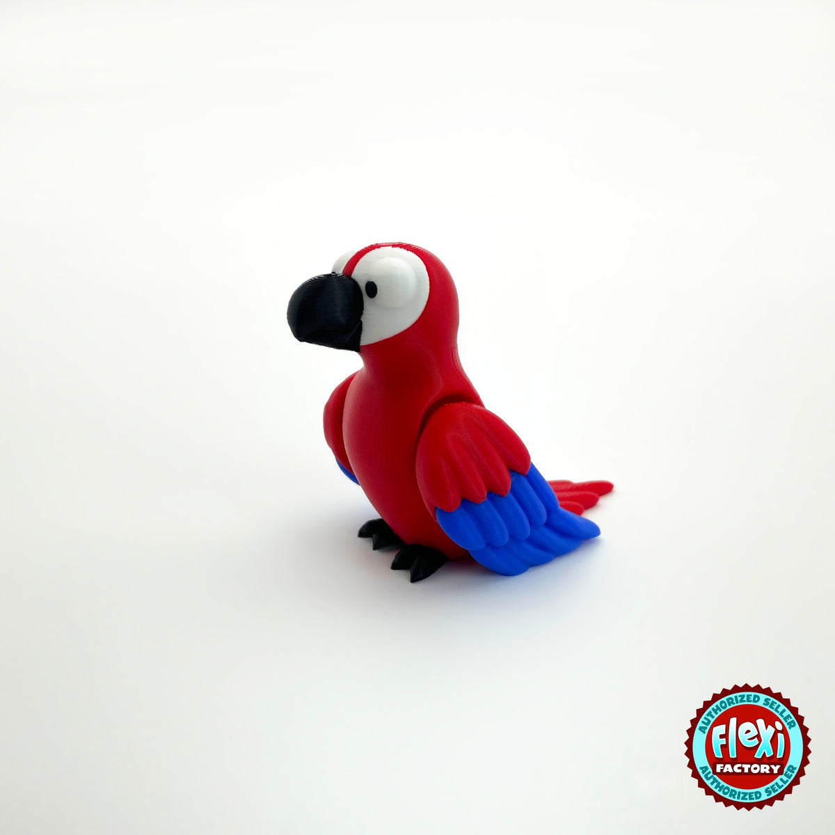 Cute parrot keychain, 3D printed by RU3D – red macaw three quarter view facing left. Green, blue and red macaw versions.