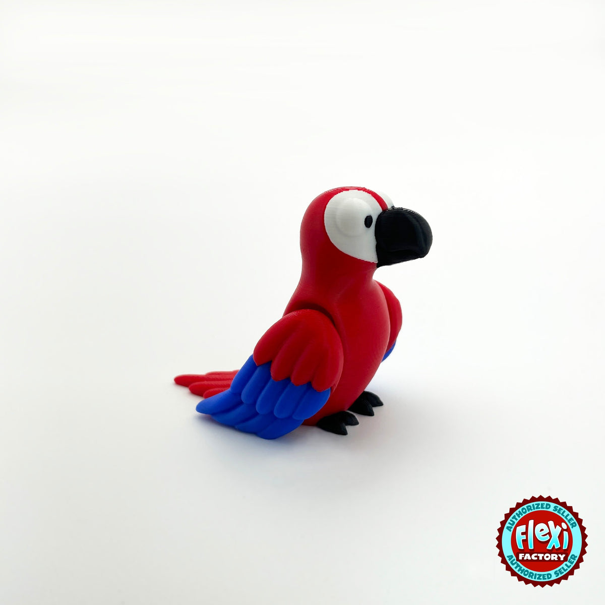 Cute parrot keychain, 3D printed by RU3D – red macaw three quarter view facing right. Green, blue and red macaw versions.