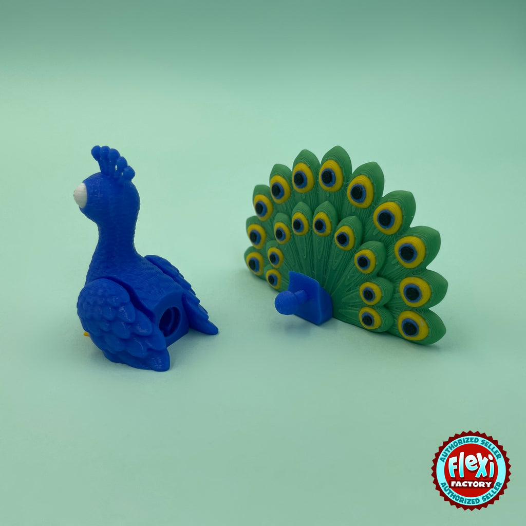 Cute peacock keychain, 3D printed by RU3D – with detachable tail feathers. Royal blue with green feather tail and pond garden playset.