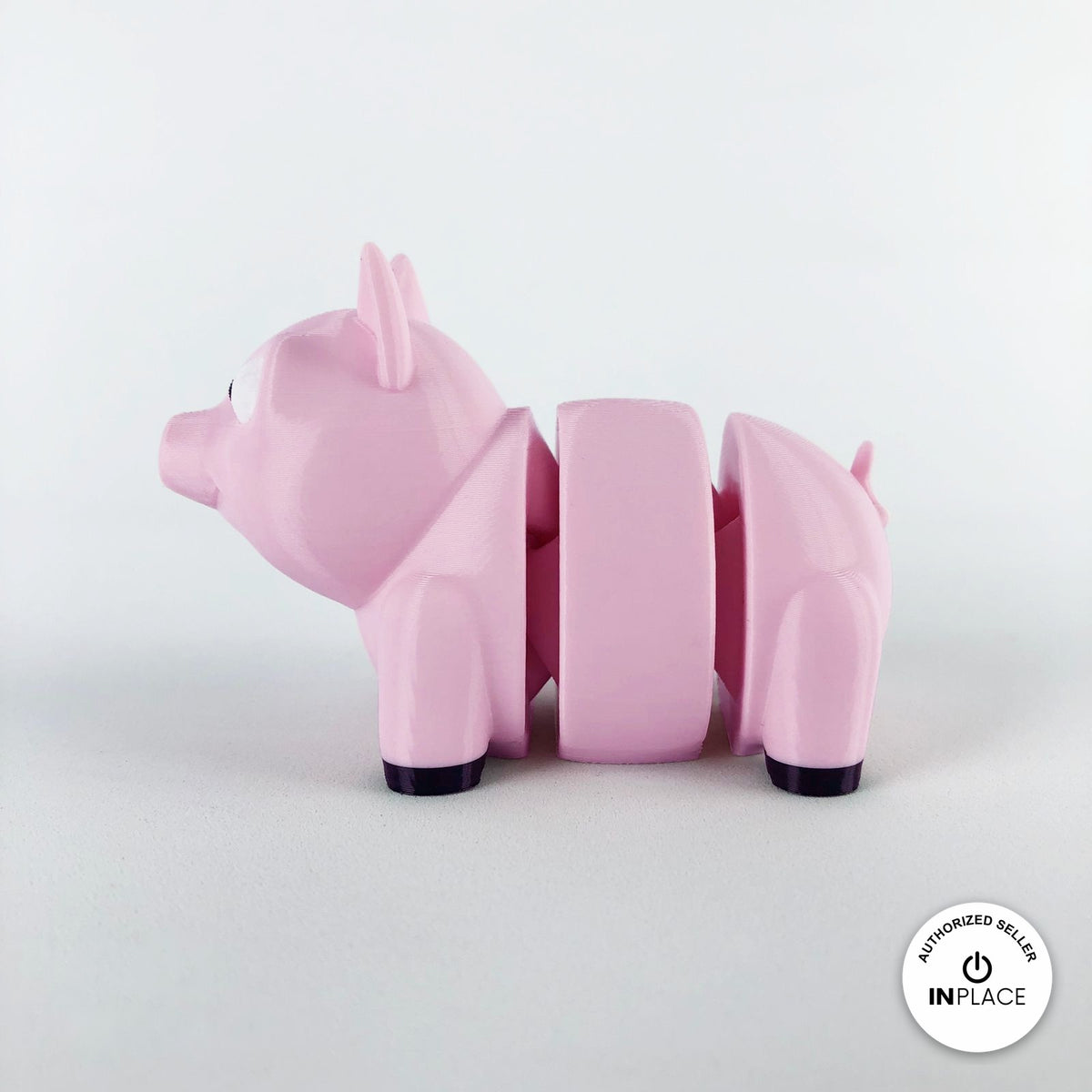 Cute pig keychain, 3D printed by RU3D – side view facing left. Pink.