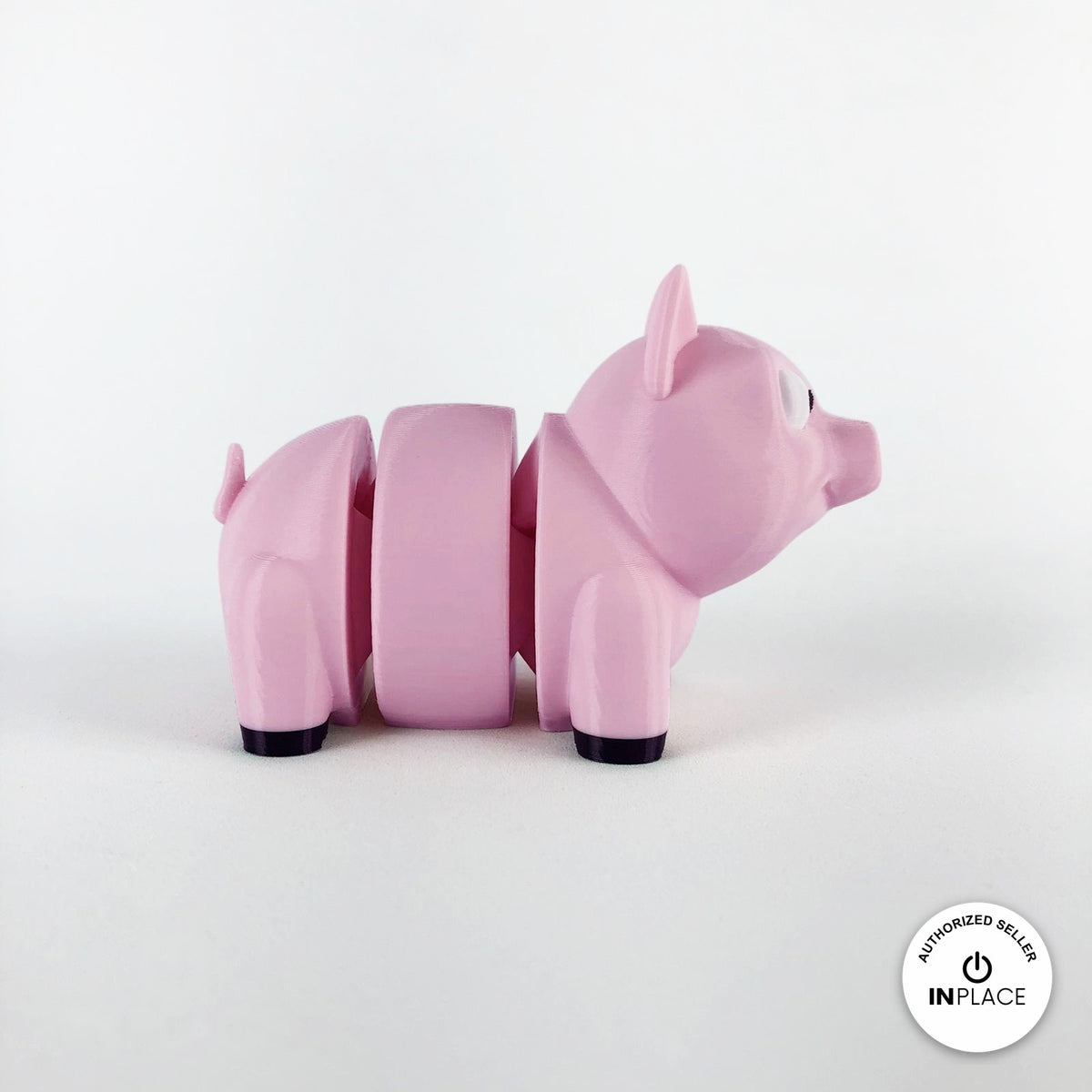 Cute pig keychain, 3D printed by RU3D – side view facing right. Pink.