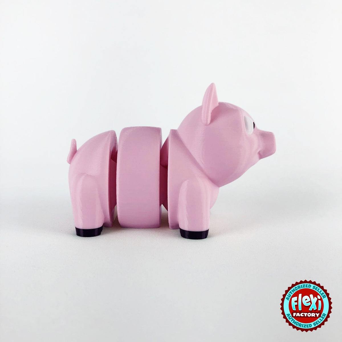 Cute pig keychain, 3D printed by RU3D – side view facing right. Pink.